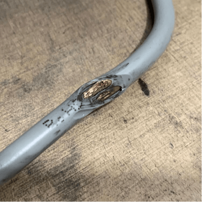 The defective cable that caused the power issue.