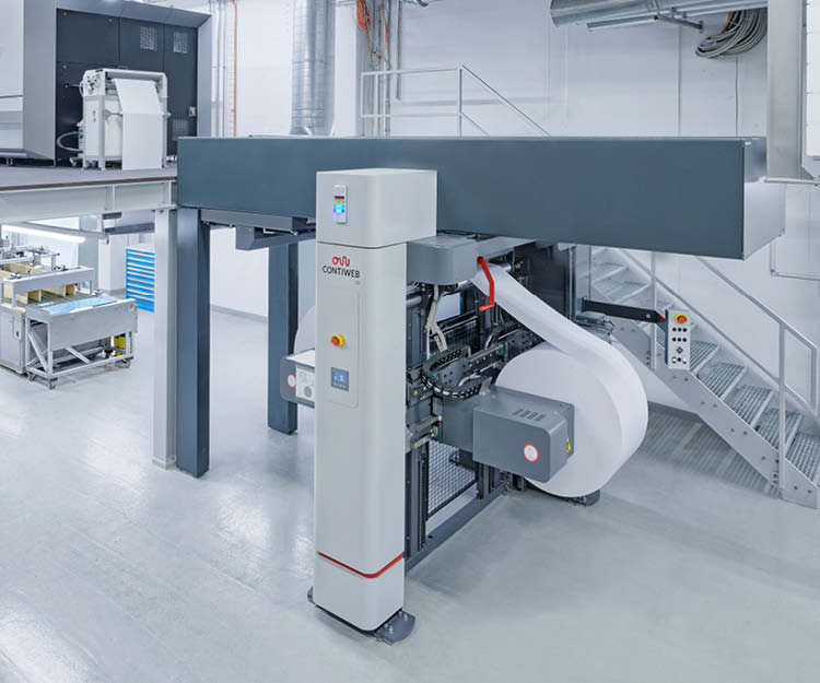 Contiweb non-stop unwinder with Canon press